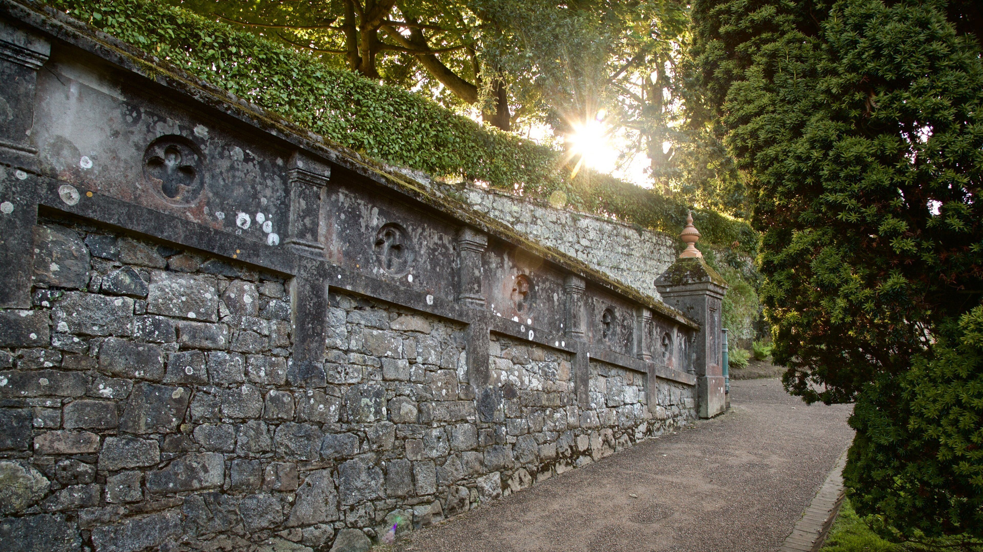 Candie Gardens showing heritage elements and a sunset