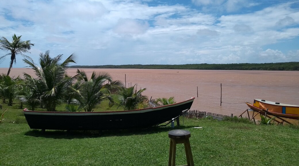 Photo of a boat stopped near the Parnaíba river. Brazilian river, located in the State of Piauí with beautiful landscapes.