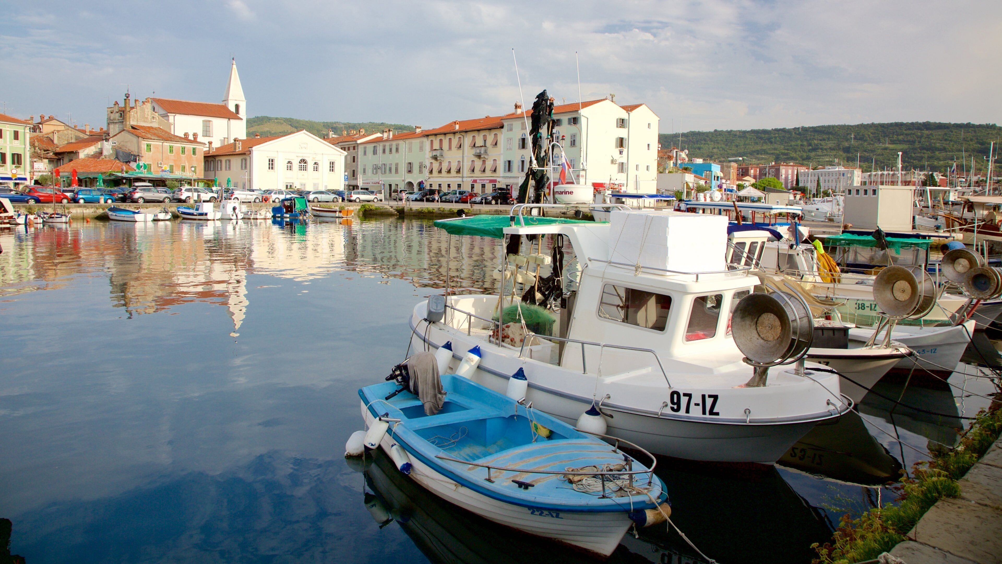 Izola Marina featuring boating, a marina and a coastal town