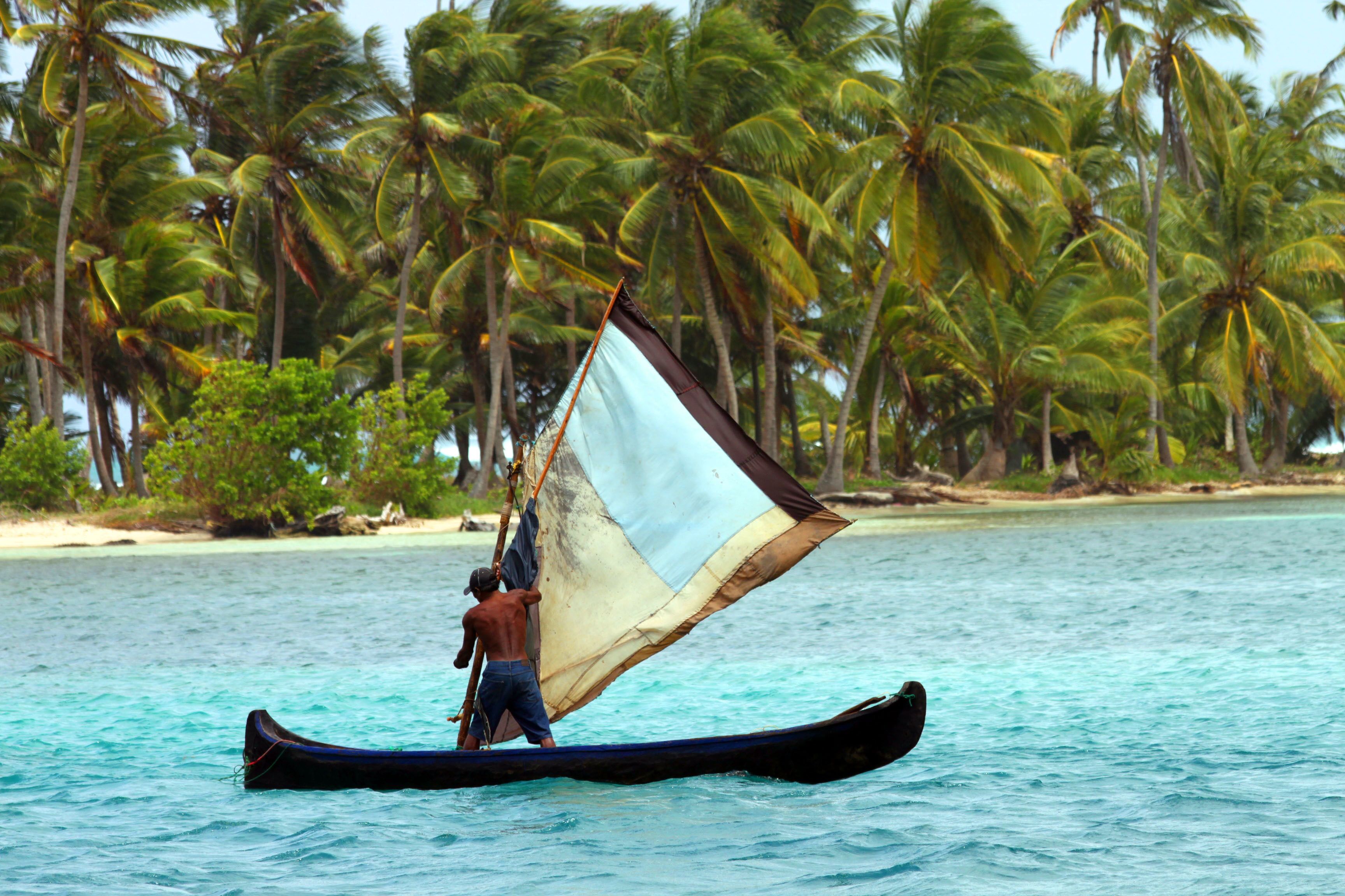 A Kuna Yala man  headed out to fish. If you have ever dreamed of spending a night or two on a small, private island, check out Kuna Yala. If you don't like roughing it a little bit, this might not be for you. There are cabins with flushing toilets but no electricity and the shower water is rather cool. Great place to get away from crowds and unplug though.

#islands #peaceful
#Adventure
#water
#ocean
#boat
#trovember