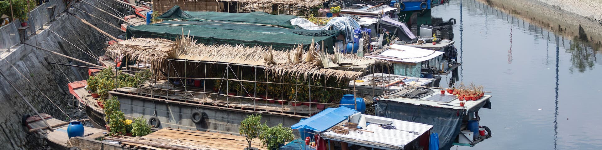 Binh Dong floating flower market before lunar new year. Boats bring flowers from the Mekong Delta to Ho Chi Minh City for Tet festival.