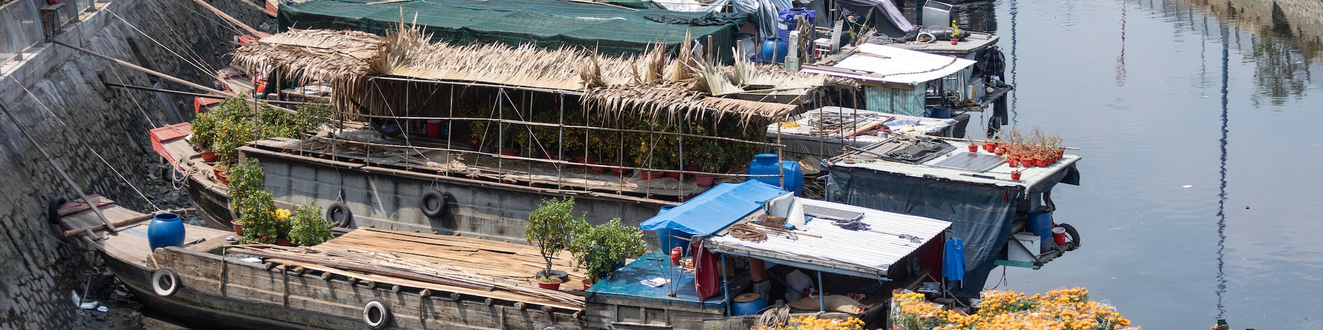 Binh Dong floating flower market before lunar new year. Boats bring flowers from the Mekong Delta to Ho Chi Minh City for Tet festival.