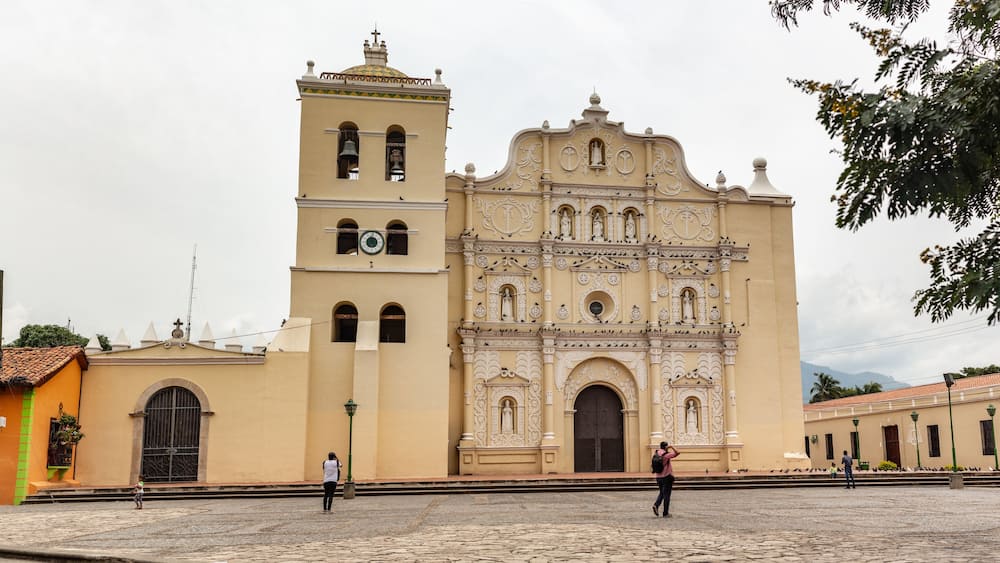 A historic church with a bell tower and ornate facade.