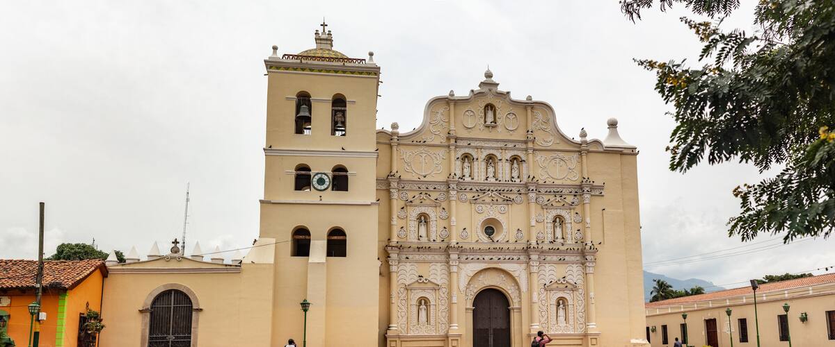 A historic church with a bell tower and ornate facade.
