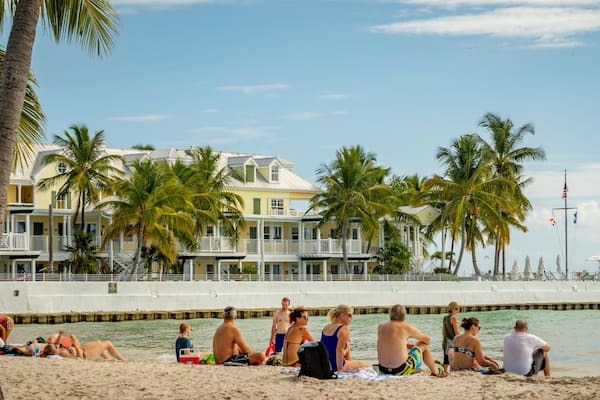 South Beach featuring a sandy beach and general coastal views as well as a small group of people