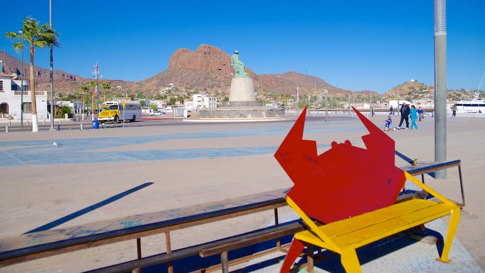 The Fisherman which includes a square or plaza and outdoor art