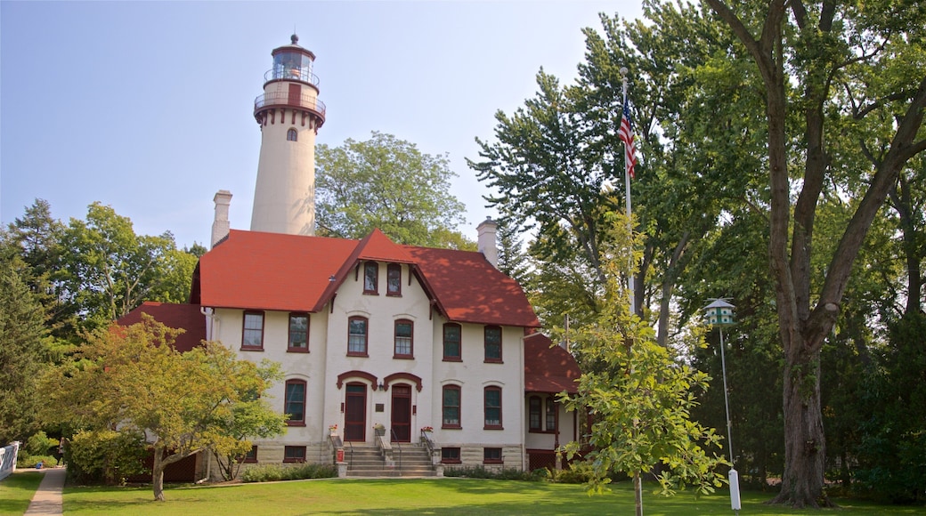 Grosse Point Lighthouse featuring a lighthouse and a house
