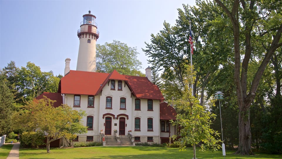 Grosse Point Lighthouse featuring a lighthouse and a house