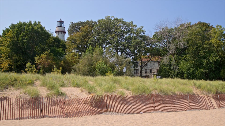 Grosse Point Lighthouse featuring a sandy beach and general coastal views