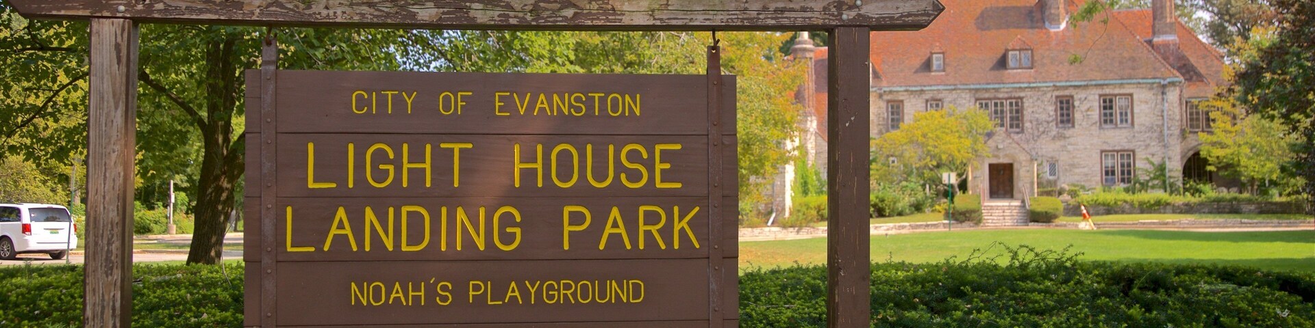 A sign for Light House Landing Park in Evanston, featuring Noah's Playground.