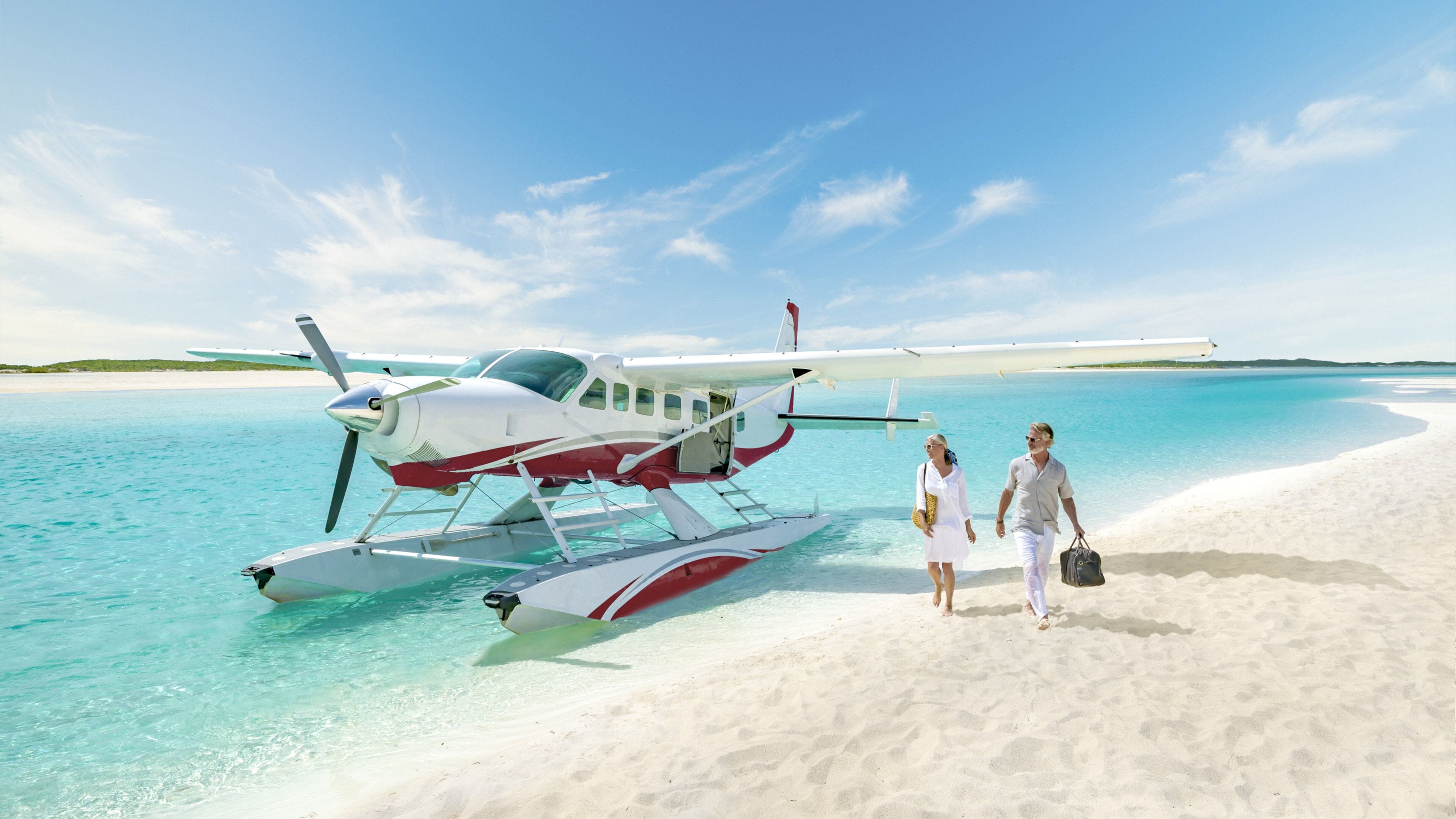 Exuma showing aircraft, a beach and tropical scenes