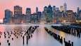 Brooklyn Bridge Park which includes a sunset, a river or creek and a city