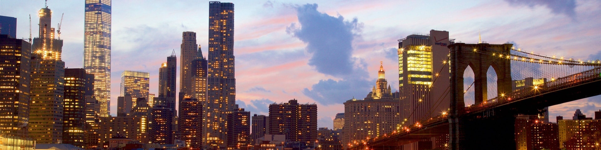 Brooklyn Heights Promenade featuring a sunset, a city and a river or creek