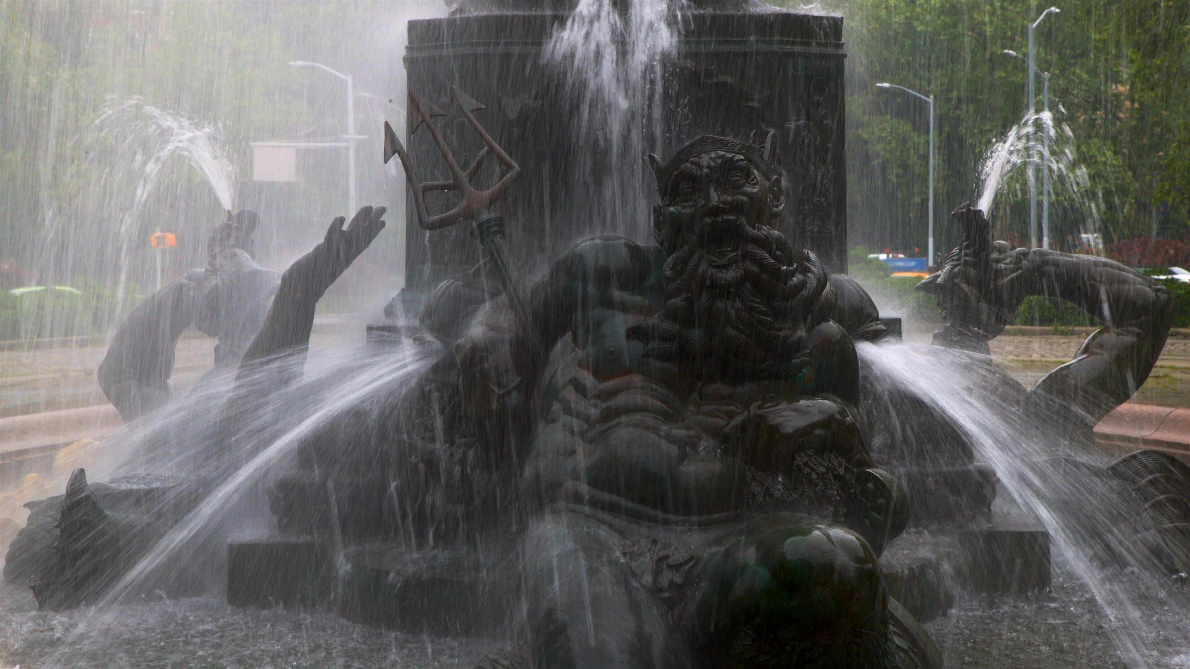 Grand Army Plaza which includes a statue or sculpture and a fountain