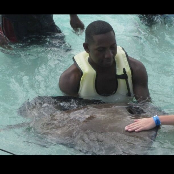 That's me there holding the stingray. I had a great time with them and the other fishes. 