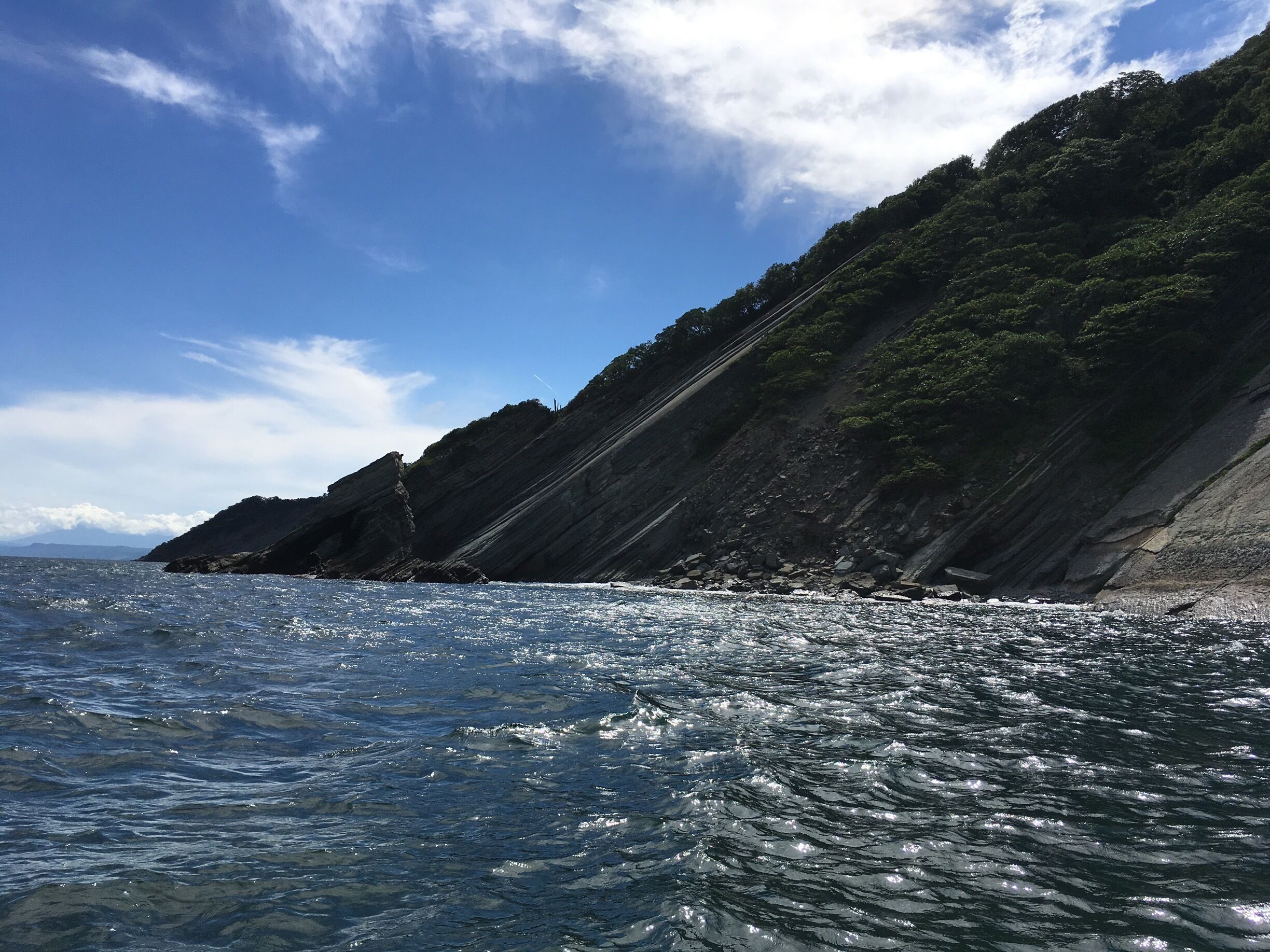 Rocks that emerged from the ocean vertically. Believed to be Inclined by the force of the ocean during time. 