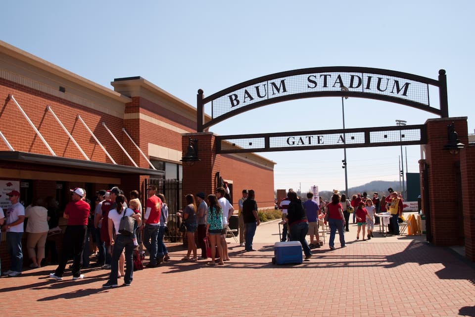 A crowd at Baum Stadium's Gate A entrance.