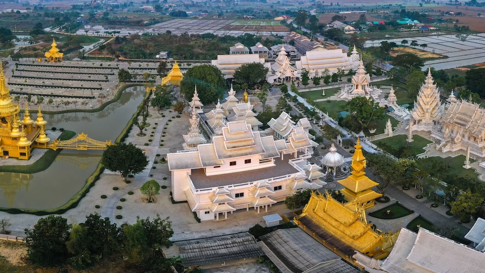 Aerial view of Wat Rong Khun, the white temple, at sunrise, in Chiang Rai, Thailand