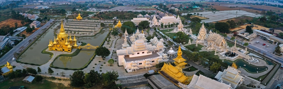 Aerial view of Wat Rong Khun, the white temple, at sunrise, in Chiang Rai, Thailand