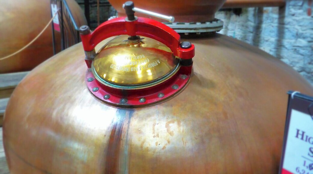 The woodford reserve distilery is home to some very good Kentucky Bourbon whiskey. owned by the same people who own a few other spirit companies this place sits in between million dollar horse farms, and is exceptionally beautiful.
This is the kettle where all the magic happens. Each kettle distills the liquor, and after three times it is put into fresh oak barrels and put into the cask house for 8-9 years. the smell in here is amazing, but very high in CO2, so don't breath in to much, or you will be drunk, and passed out.