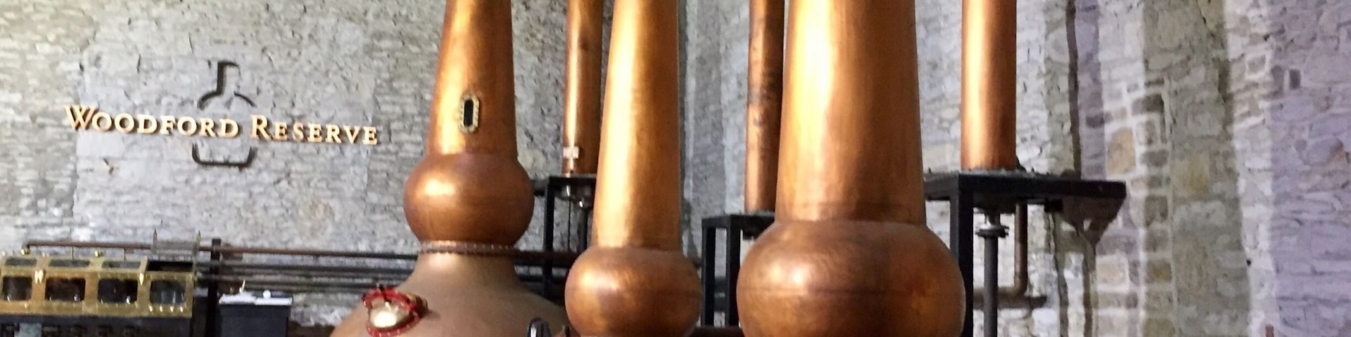The triple
Copper distillation stills at Woodford Reserve. They are the only distillery to use three stills in the process of making bourbon.