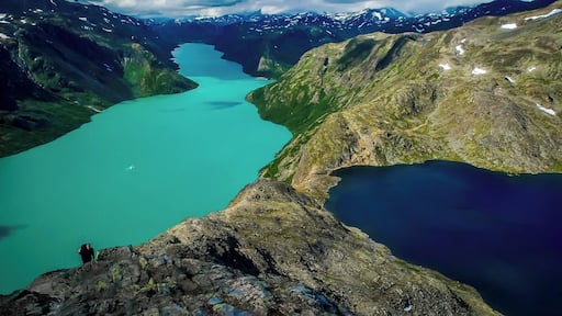 Besseggen. Norway´s most famous hike, a trail along a steep ridge that separates two colorful lakes. You take a boat up tha lake then hike back. In the foreground you see the steep scrambling part of the trail. #GreatOutdoors
#adventure
#Trovember