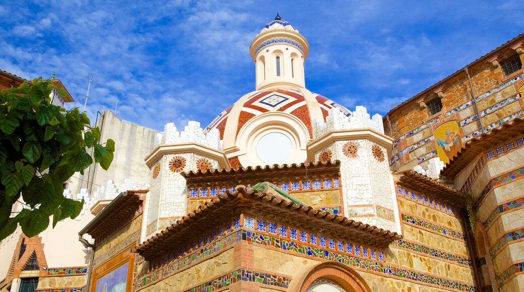 Parish Church of Sant Roma which includes heritage architecture and street scenes