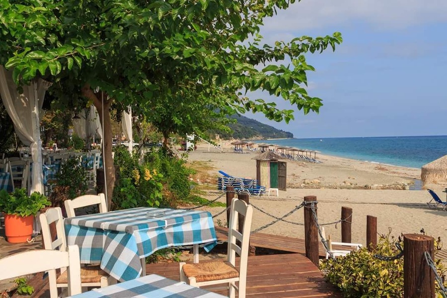 Chorefto beach on Pelion-where the mountains meet the sea.Check the numerous beaches on the Pelion peninsula, have a luch of spetzofai (dish with local sausage) in a mountain tavern with a view under an ancient chinar tree or have a strol in the nearby Volos city and see the replica of the Agronauts ship