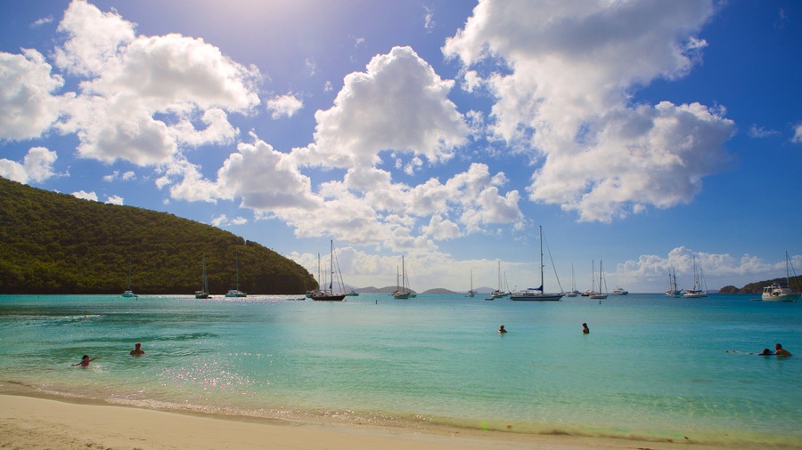 Maho Beach showing a sandy beach and a bay or harbour