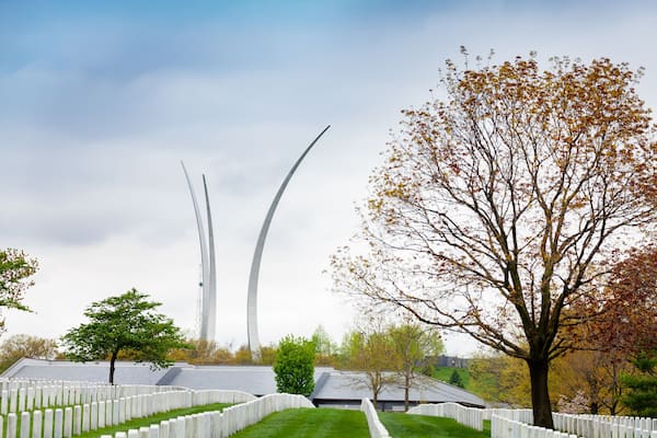 Air Force Memorial in Arlington over military cemetery rows of tombstones