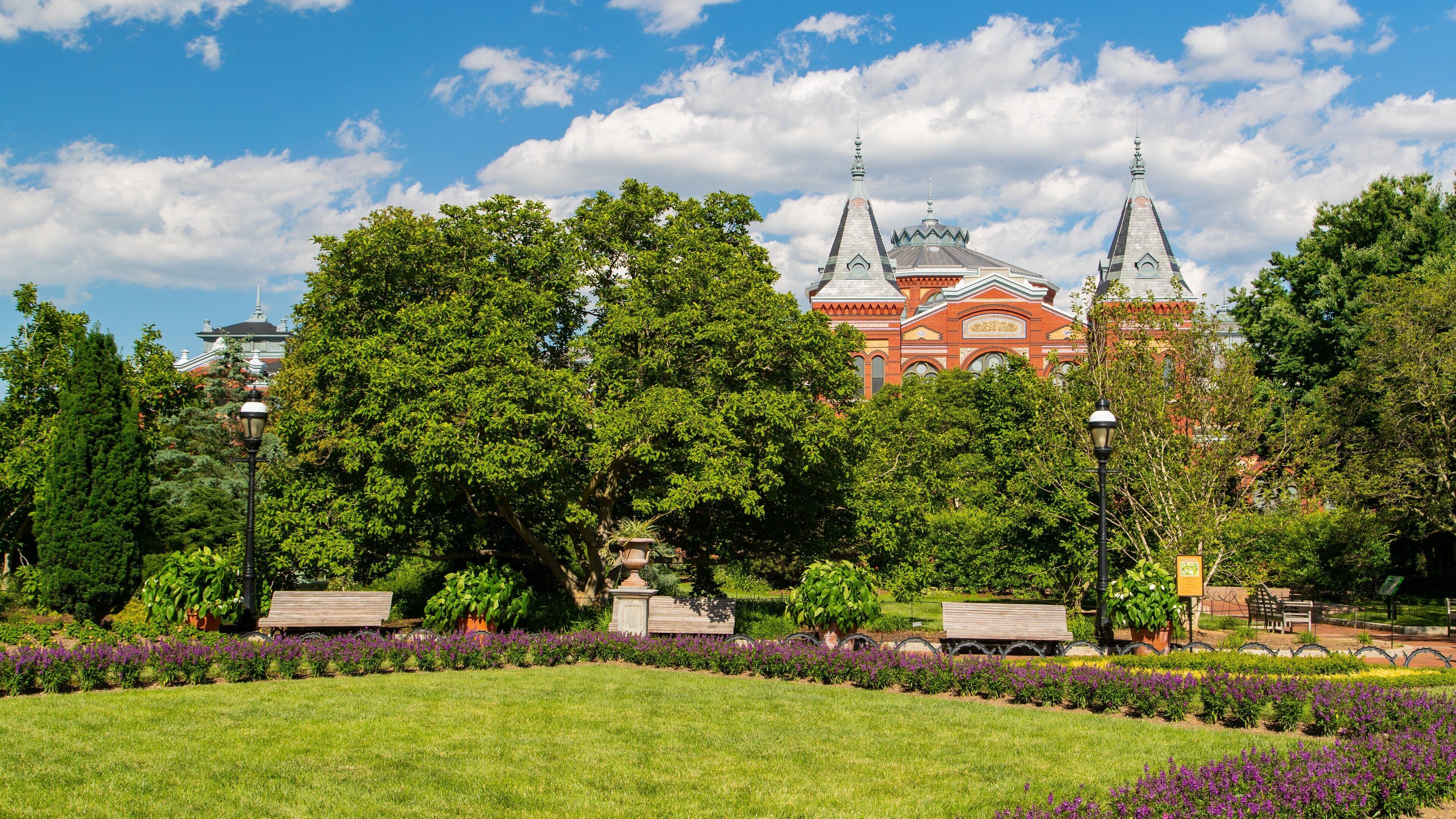 Arts and Industries Building featuring a park