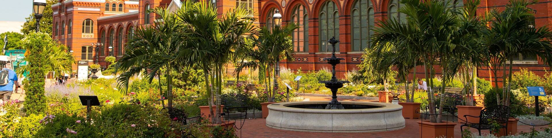 Arts and Industries Building which includes a fountain, a park and heritage architecture