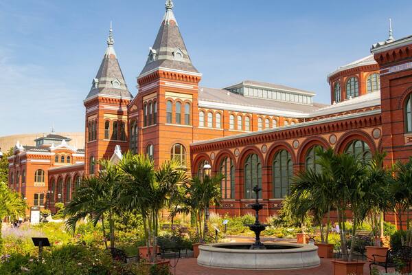 Arts and Industries Building which includes a fountain, a park and heritage architecture