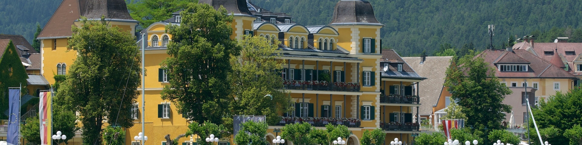 Velden am Woerthersee featuring a bay or harbor and heritage elements