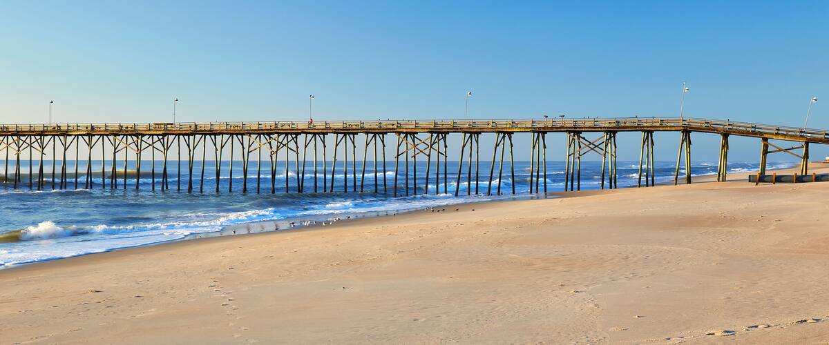 Ocean waves and fishing pier at Kure Beach, North Carolina