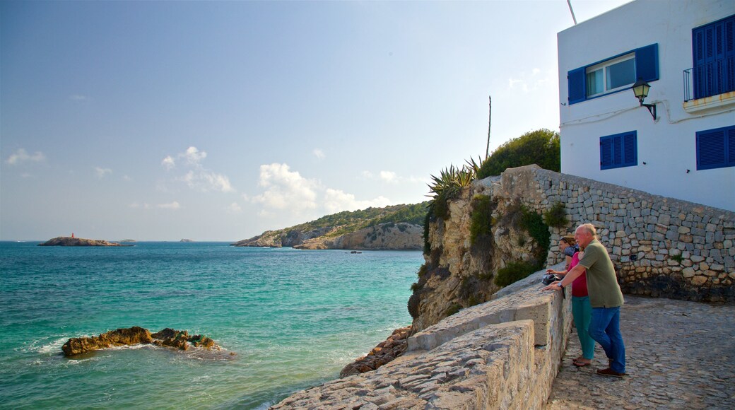 Sa Penya which includes general coastal views and a sunset as well as a couple