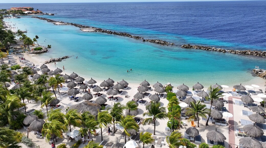 Mambo Beach At Willemstad In Netherlands Curacao. Idyllic Beach. Nature Landscape. Willemstad At Netherlands Curacao. Tourism Background. Island Seascape.