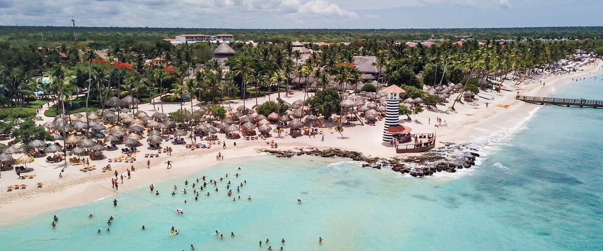 Beautiful Beach at a resort in the Caribbean. View of the beach and the lighthouse. Aerial view