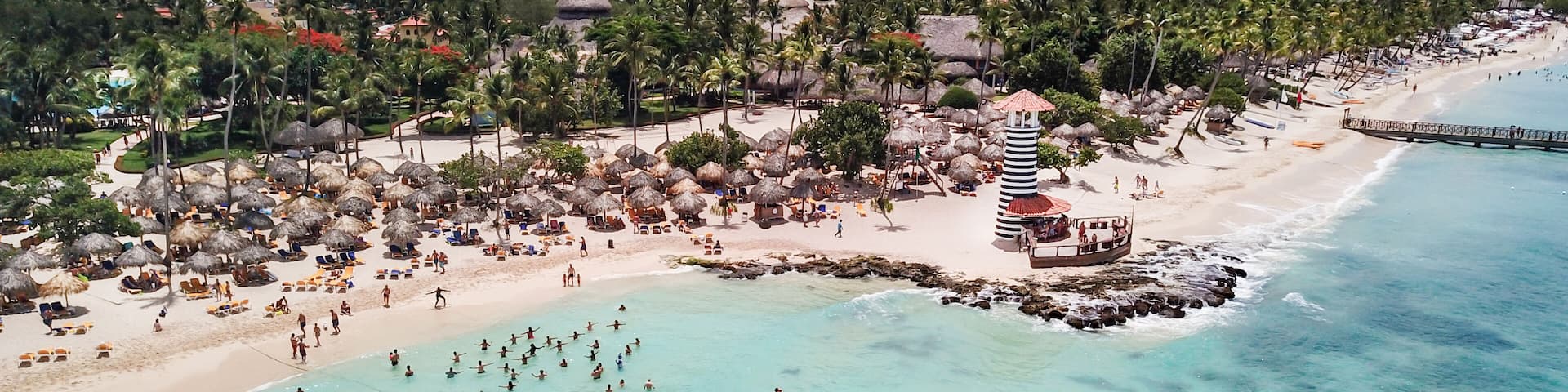 Beautiful Beach at a resort in the Caribbean. View of the beach and the lighthouse. Aerial view