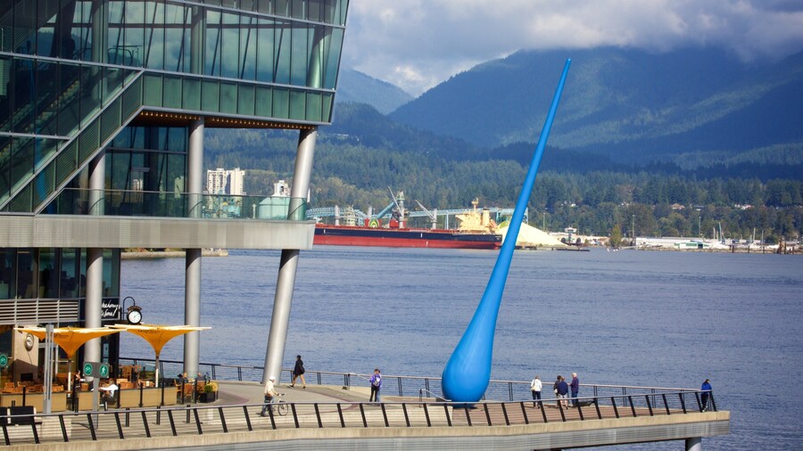 Vancouver Waterfront which includes a bay or harbor and outdoor art