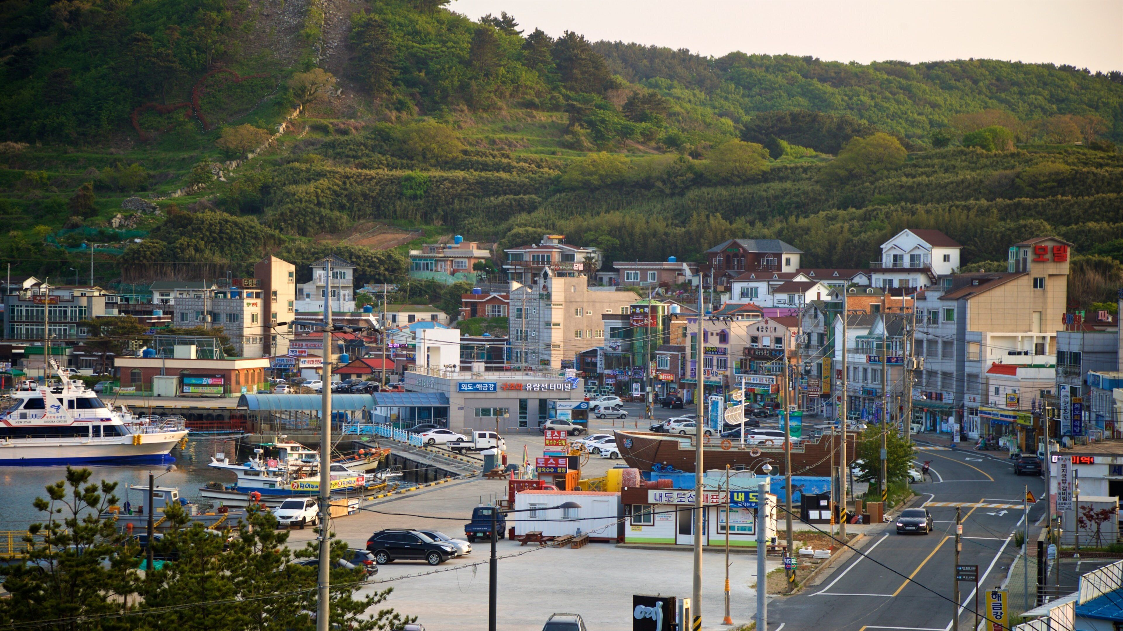 Gujora Beach which includes landscape views and a small town or village