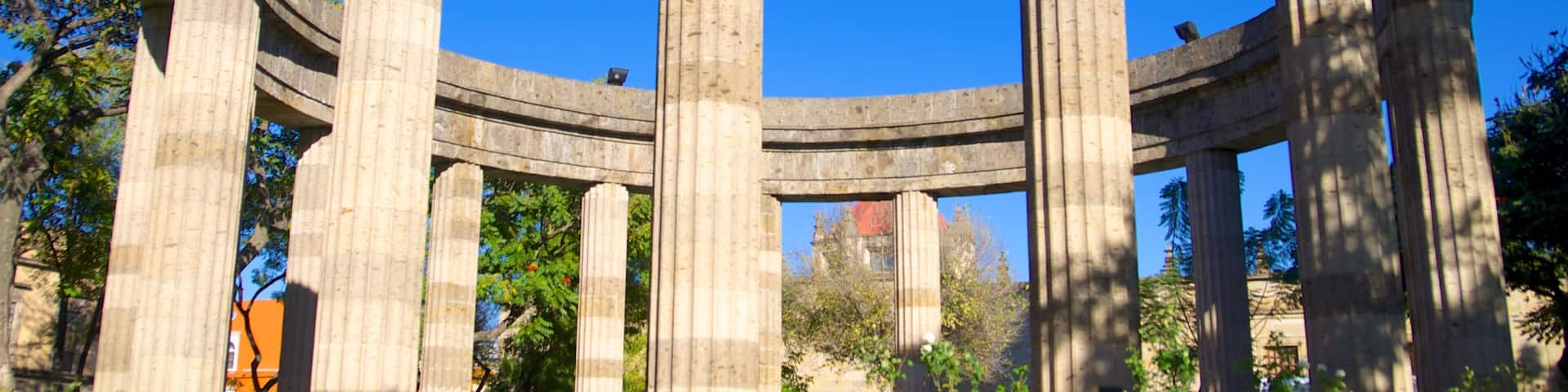 Rotonda de los Hombres Ilustres featuring a memorial and heritage architecture
