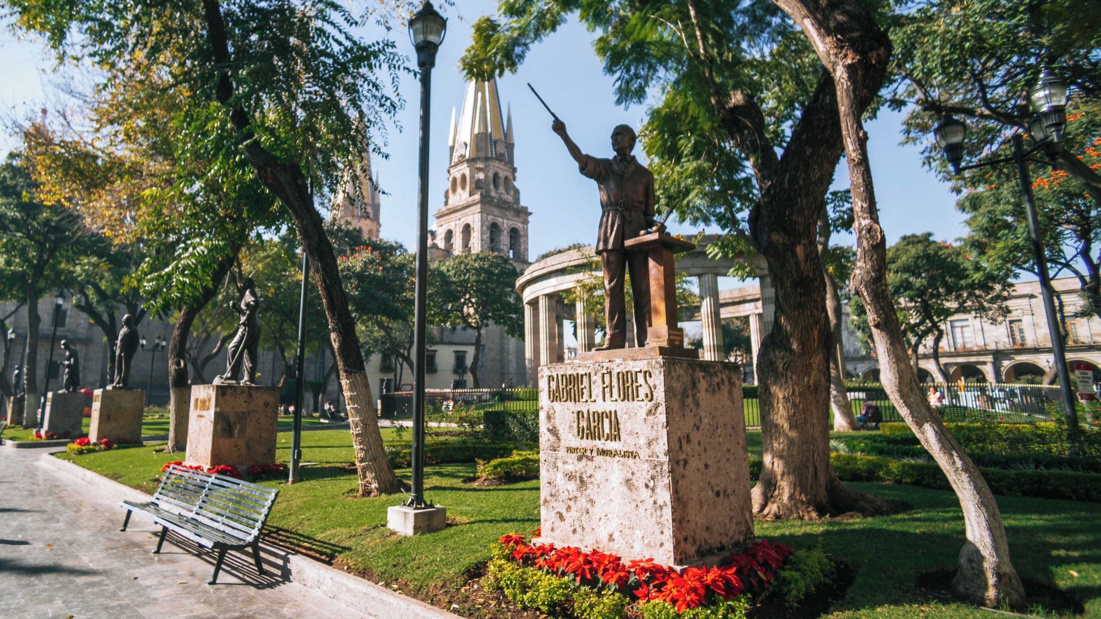 Exploring Rotonda de los Jaliscienses Ilustres in Downtown Guadalajara, a Historical Landmark Surrounded by Lush Greenery