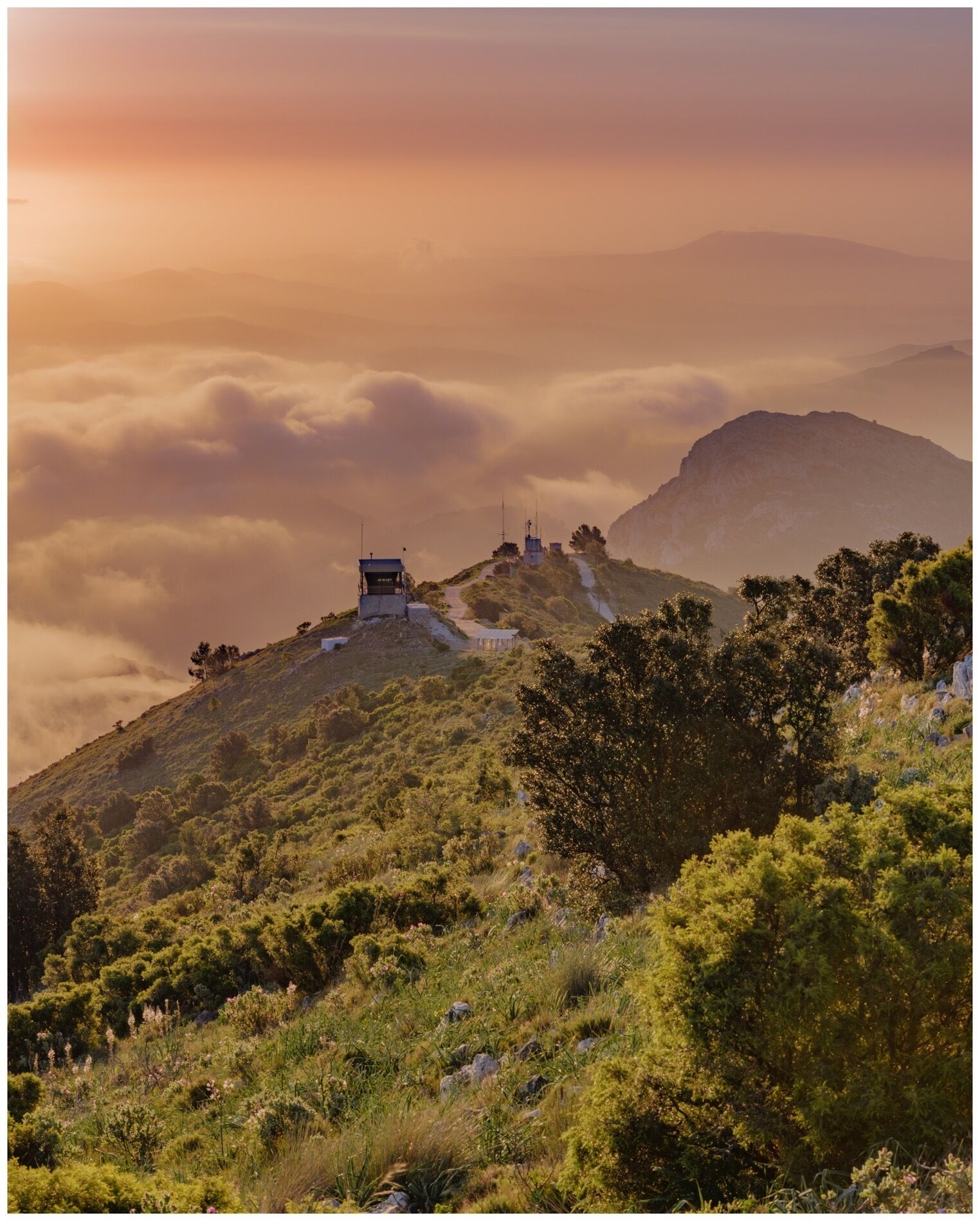Not far from the busy resorts of Benidorm & Altea is the fantastic scenery and mountains of the Alicant District. This shot was taken at sunrise from the aerial station on the top of ‘Cim Carrascal’. To get there drive or cycle to the restaurant at the top of the Coll de Rates (CV715) from here walk up the track to the aerial station, good quality track, approx 50mins depending on your fitness level. There are great photographic opportunities all the way up. Great at sunset also.