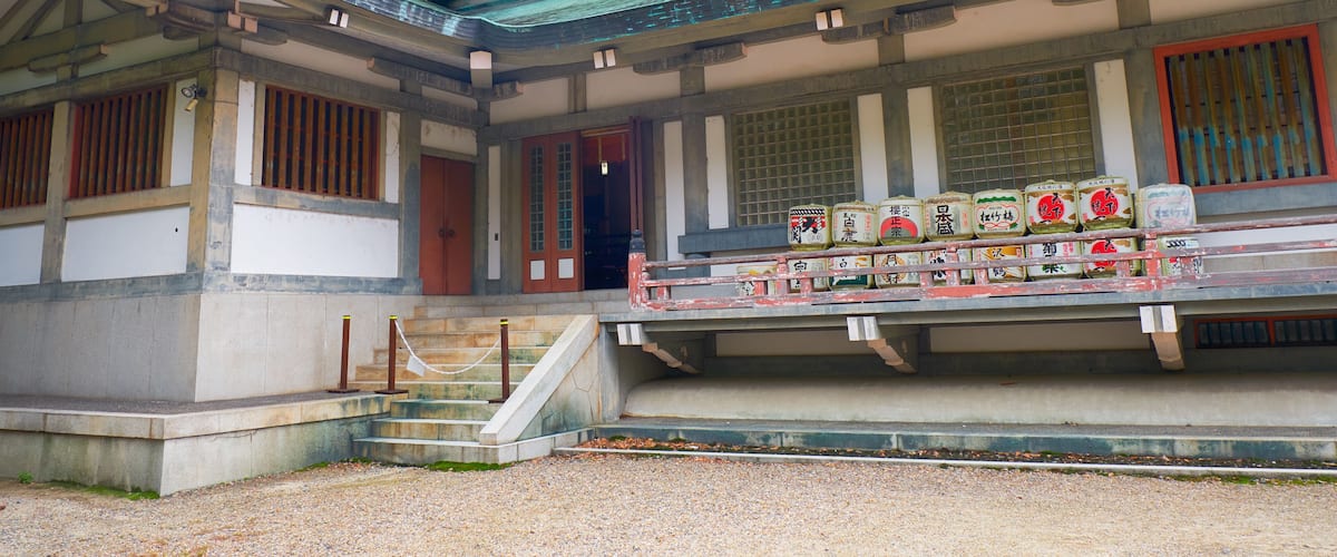 A traditional Korean building with a green roof and wooden accents.