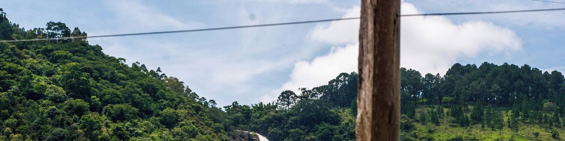 Only one hour and a half away from São Paulo, the biggest city in Brazil, you will find the little town Joanopolis. Sadly most pathways to the main waterfall are in private properties so you can't get to close (this is not the closest you can get). Still, it is just great to stay in the camping ground nearby and sleep to the sound of the running water.