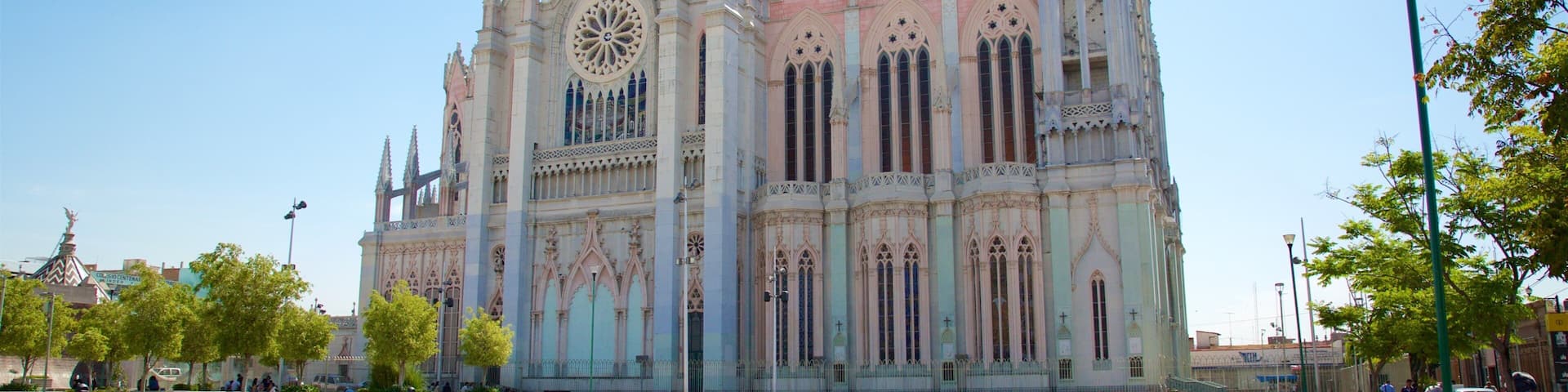 A large, ornate cathedral with a rose window and spires.