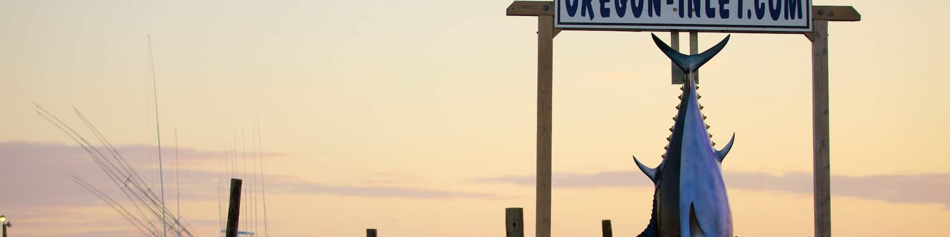 Oregon Inlet Fishing Center which includes boating, signage and fishing