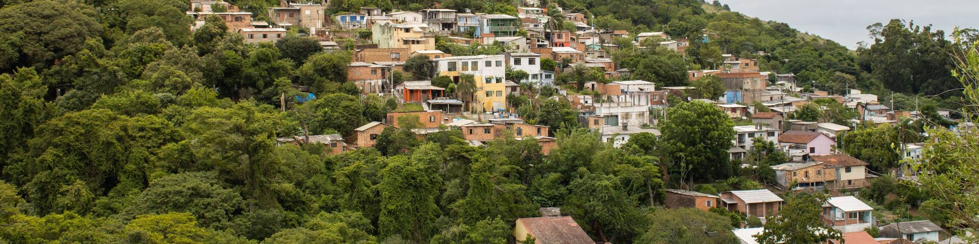 PORTO ALEGRE, RIO GRANDE DO SUL, BRAZIL - JANUARY 21, 2021: View of a community located next to Hospital Divina Providência on a hill amidst trees.
