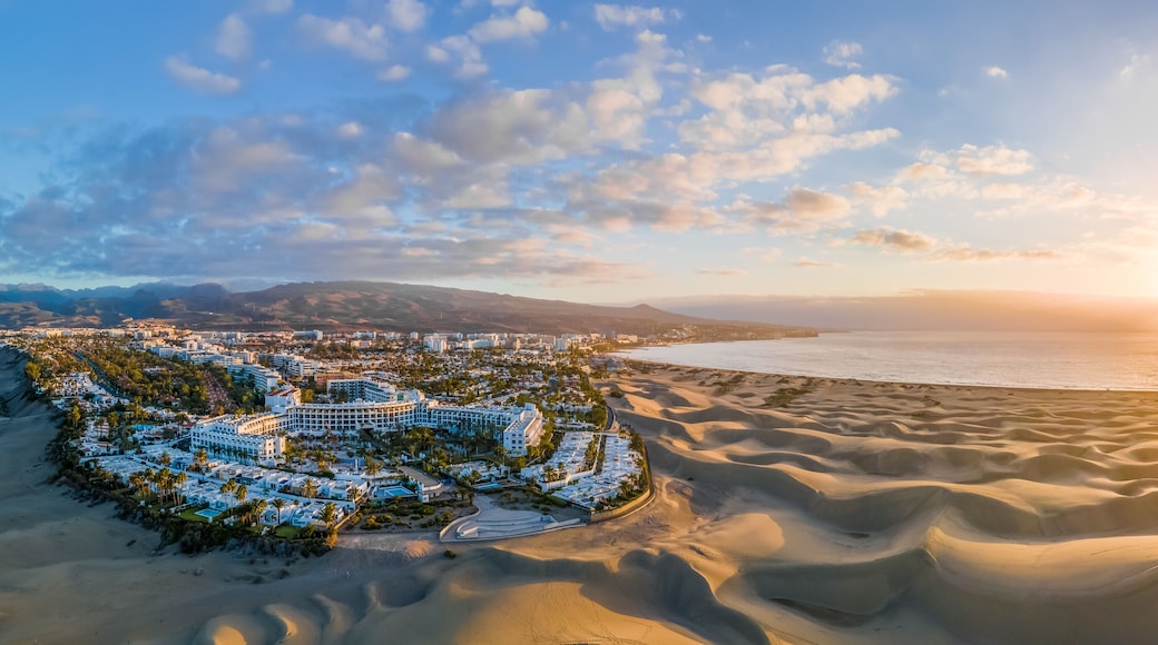 Landscape with Maspalomas town and golden sand dunes at sunrise, Gran Canaria, Canary Islands, Spain